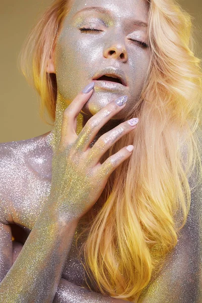 Young Woman Yellow Paint Liquid Paint Flowing Beautiful Face Body Stock  Photo by ©EugenePartyzan 209518192