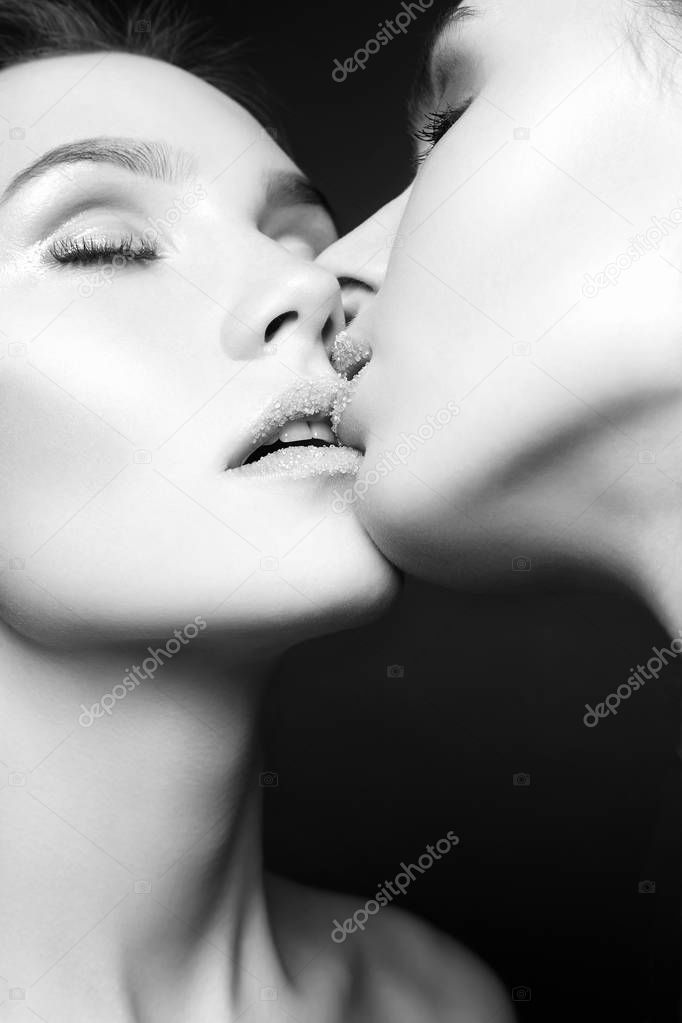 kiss of Couple Women with sugar on lips