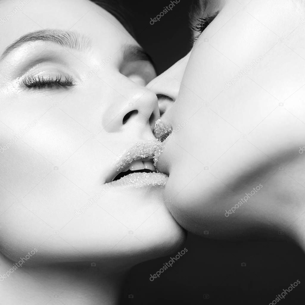 kiss of Couple Women with sugar on lips