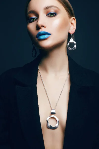 Beautiful sexy woman with color make-up and jewelry — 스톡 사진