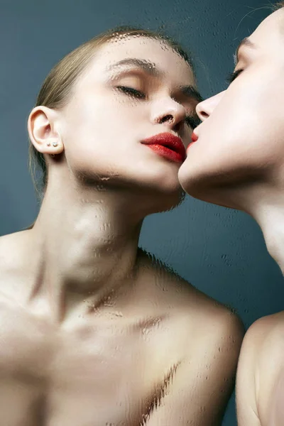 Beautiful Girl kissing wet mirror. Sensual Young woman — Stock Photo, Image