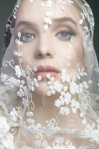 Bride under a veil. beautiful female lovely Face — Stock Photo, Image