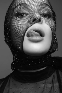 Beautiful Woman in Net. Black and white Beauty & Fashion portrai