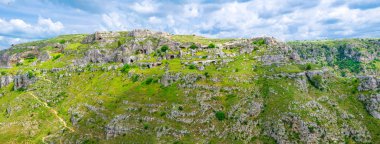 Uçurumu Kanyonu kayalar ve evlerde görünümünü mağaralar di Murgia Timone yakınındaki eski antik kenti Matera (Sassi), Unesco Dünya Mirası, Basilicata, Güney İtalya