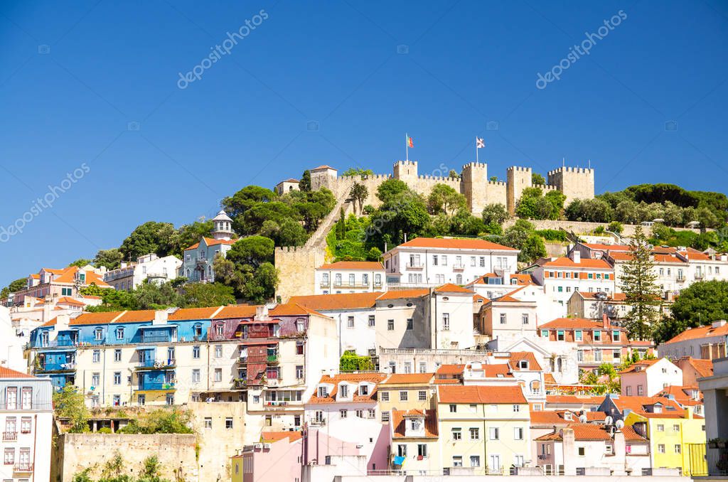 Portugal, panoramic view of Lisbon in summer, Lisbon fortress hill lose-up, touristic centre of Lisbon, St. George medieval Castle in Lisbon, forest on the highest hill in Lisbon