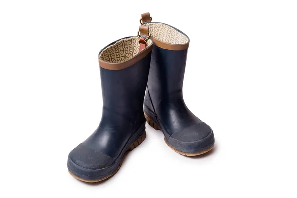 Blauwe versleten gumboots op witte achtergrond — Stockfoto