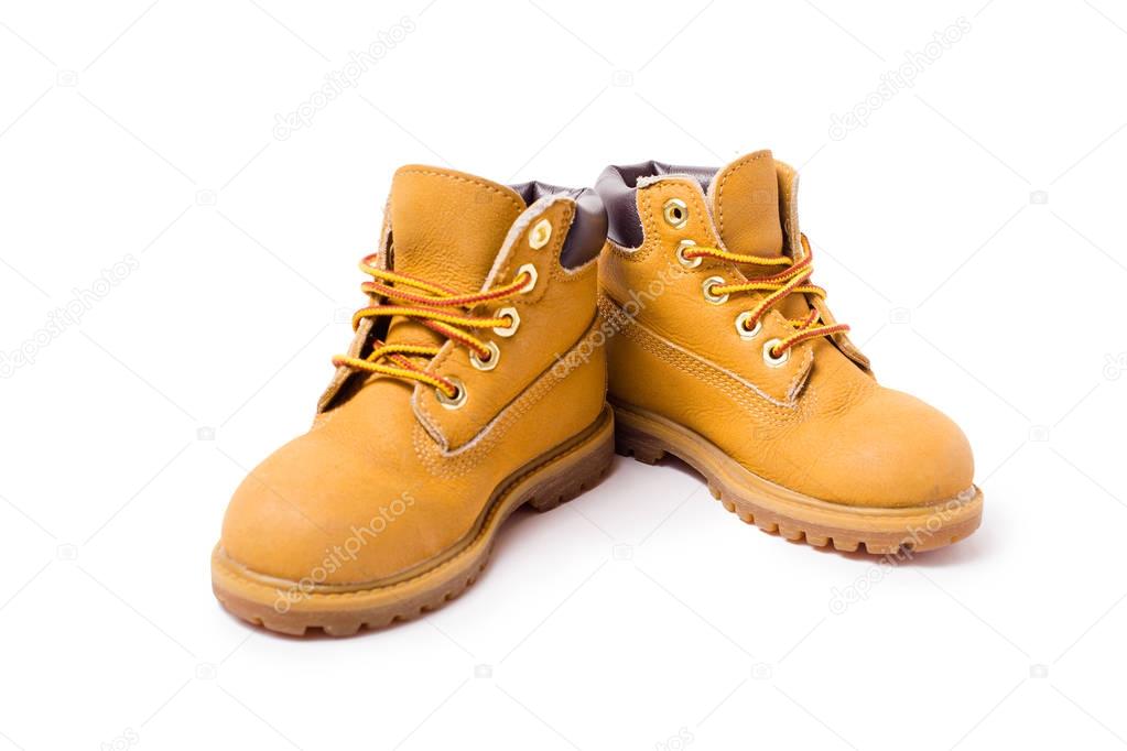 Yellow boots isolated on white background