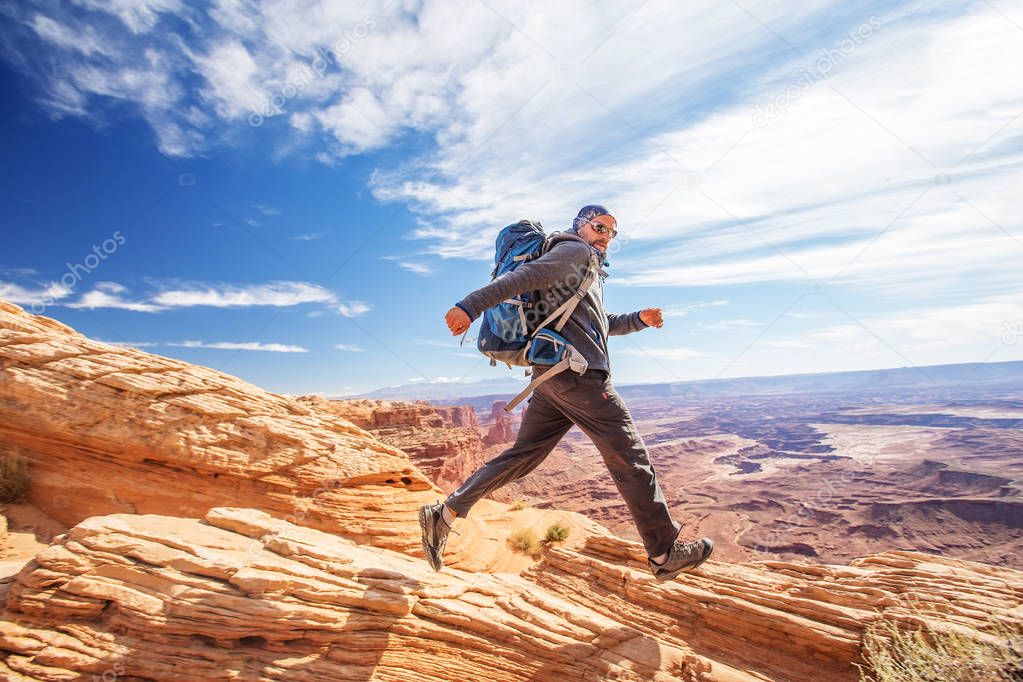 Hiker in Canyonlands National park in Utah, USA