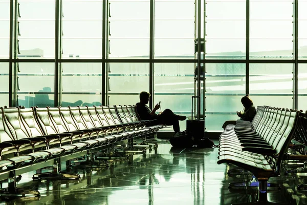 Chairs in the departure hall at airport — Stockfoto