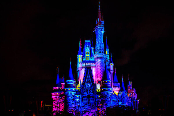 Orlando, Florida. November 15, 2019 Illuminated and colorful Cinderella Castle in One Upon a Time Show at Magic Kingdom (2).