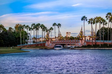 Orlando, Florida. December 18, 2019. Colorful bridge and taxi boat in Lake Buena Vista area (47).