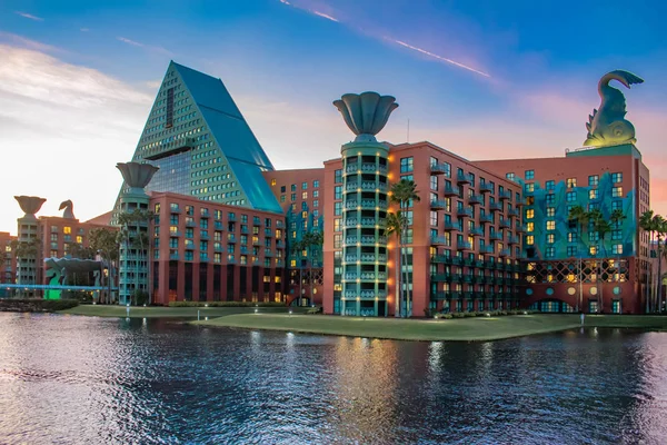 Orlando, Florida. December 18, 2019. Walt Disney World Dolphin Hotel on sunset background in Lake Buena Vista area (5).