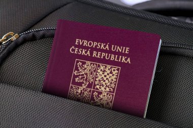 Close up of Czech Republic Passport in Black Suitcase Pocket  clipart