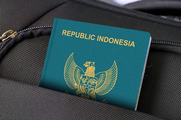 Close up of Indonesia Passport in Black Suitcase Pocket — Stock Photo, Image