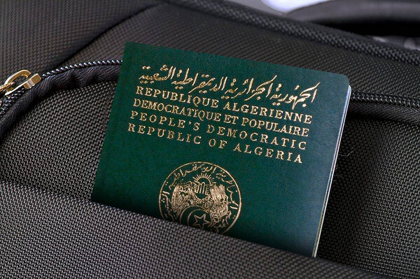 Close up of Algeria Passport in Black Suitcase Pocket 