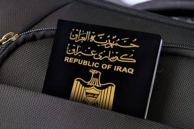 Irak pasaportunu siyah bavulla kapat. 