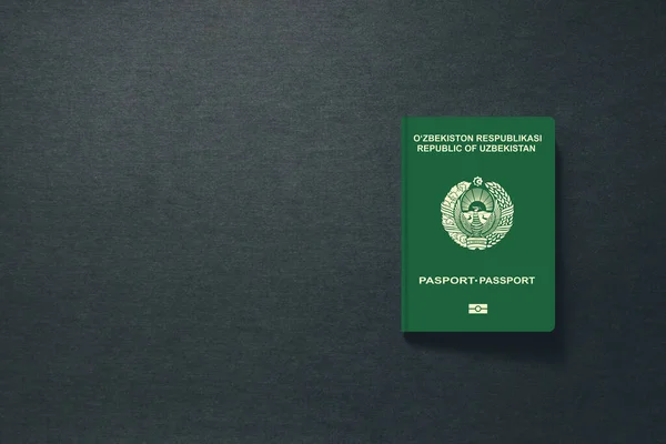 Uzbekistán Pasaporte sobre fondo oscuro con espacio de copia - Ilustración 3D — Foto de Stock