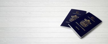 Antigua and Barbuda Passports on Wood Lines Background Banner with Copy Space - 3D Illustration clipart