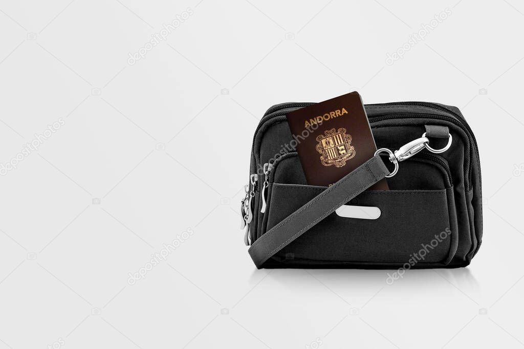 Andorra Passport in Black Travel Bag Pocket with Copy Space on Isolated Background