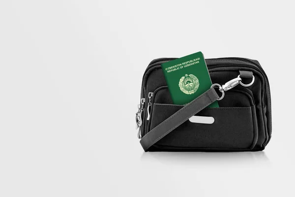 Паспорт Узбекистану Black Travel Bag Pocket Copy Space Isolated Background — стокове фото