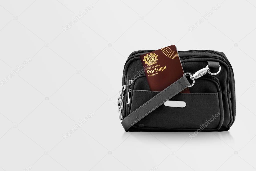 Portugal Passport in Black Travel Bag Pocket with Copy Space on Isolated Background