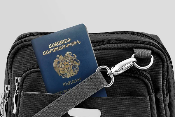 Close up of Armenia Passport in Black Travel Bag Pocket
