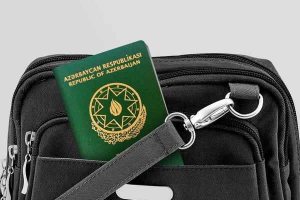 Close up of Azerbaijan Passport in Black Travel Bag Pocket