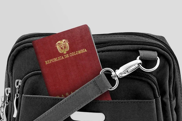 Close up of Colombia Passport in Black Travel Bag Pocket