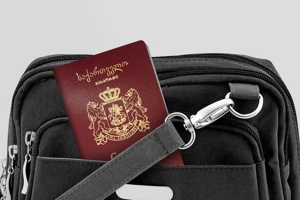 Close up of Georgia Passport in Black Travel Bag Pocket