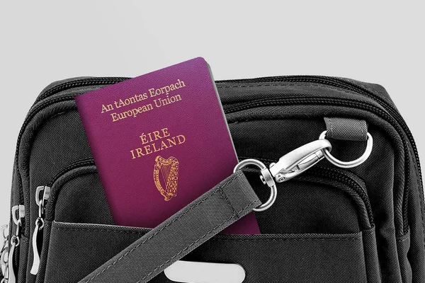 Close up of Ireland Passport in Black Travel Bag Pocket