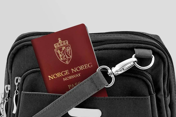 Close up of Norway Passport in Black Travel Bag Pocket