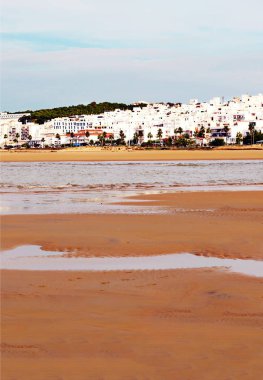 Beach of Conil de la Frontera in Andalusia clipart