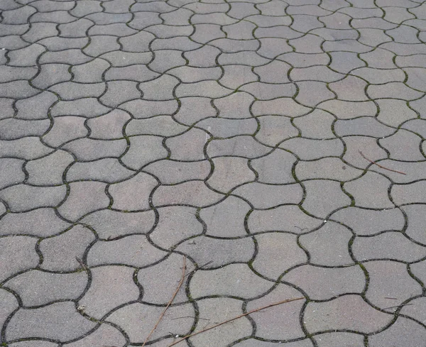 ジグソーパターンのコンクリートブロックの舗装 — ストック写真