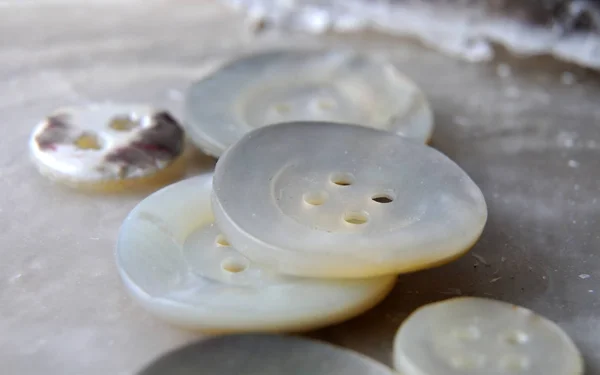 Group of old buttons of mother-of-pearl — Stock Photo, Image