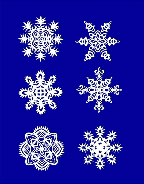 Cortar copos de nieve de papel — Vector de stock