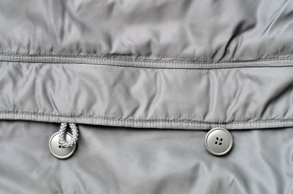Detalhe de um casaco de peles de inverno. Casquilho e casa de botão — Fotografia de Stock