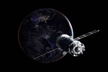 Rus insanlı uzay aracı Dünya 'nın yörüngesinde. Amerika. Bu görüntünün elementleri Nasa tarafından döşenmiştir.