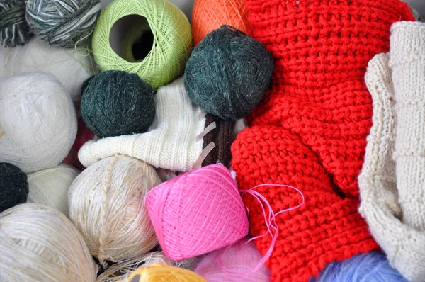 Yarn for knitting. Colored balls of yarn. View from above. Skeins of yarn. Homework, hobbies
