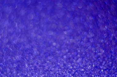 Soyut Yeni Yıl menekşe örtüsü arkaplanı parlayan defocus kıvılcımlarıyla. Bulanık simler parıldayan toz makrosu kapat, metin logosu için alanı kopyala