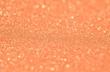 Soyut Yeni Yıl mercan bokeh arkaplanı parlayan sönük parlaklıklarla. Bulanık simler parıldayan toz makrosu kapat, metin logosu için alanı kopyala