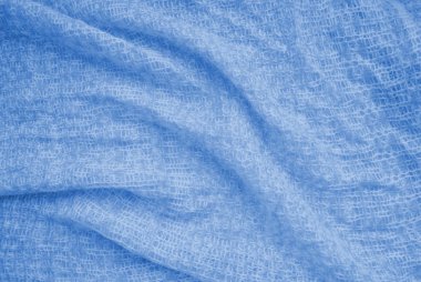 Arka plan için örülmüş doku. Klasik mavi renk. 2020 yılının rengi. Moda rengi.