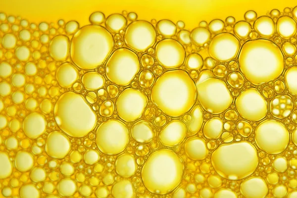 Yellow water bubbles — Stock Photo, Image