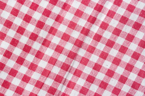 Red and white checkered picnic tablecloth. — Stock Photo, Image