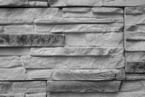Blízkou starodávnou zeď, tenká žulová cihlová. — Stock fotografie
