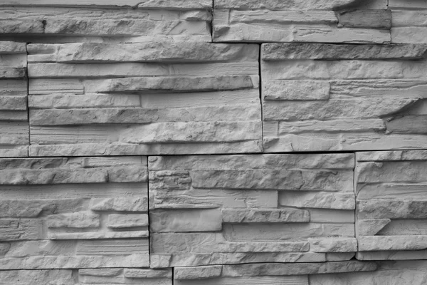 Close-up slanke graniet bakstenen, oude muur. — Stockfoto