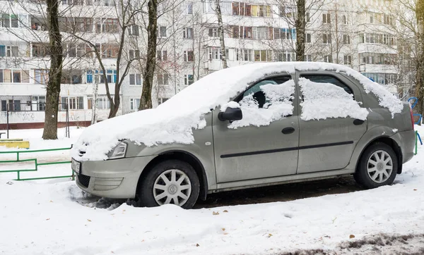 Renault Dacia Logan after snowfall. — Stock Photo, Image