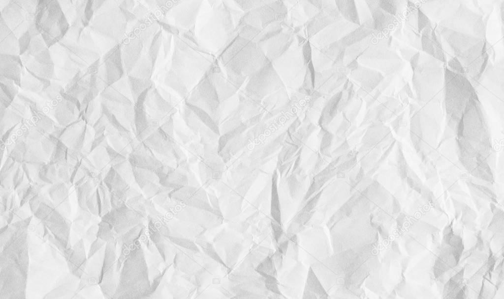 White crumpled paper sheet background. 