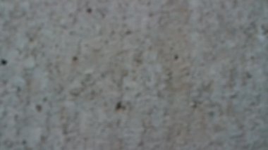 Gri çimento yapısı yakın çekim, asfalt. Odak için defocused