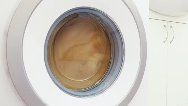 Timelapse, proces van kleren wassen in de wasmachine. — Stockvideo