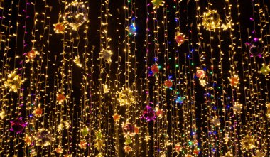 Güzel renkli tatil çelenkleri. Noel ya da Yeni Yıl tatili renkli bir geçmiş.